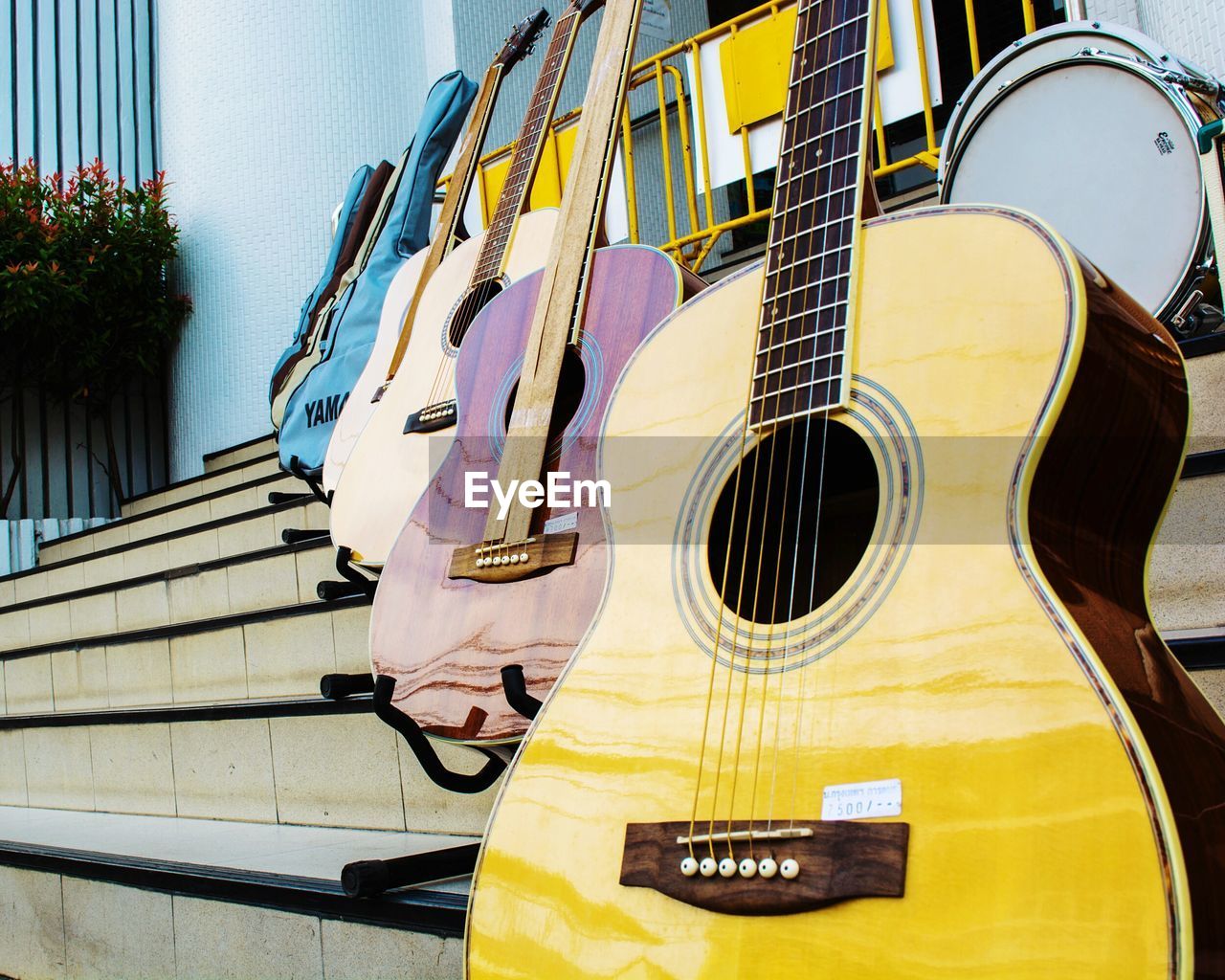 Close-up of guitars on stairs