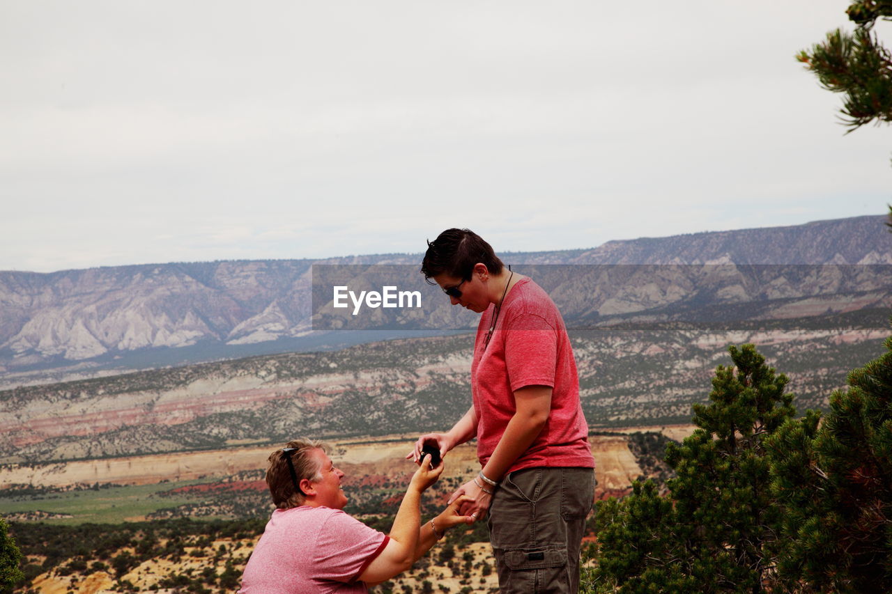 Lesbian woman proposing wife at dinosaur national monument