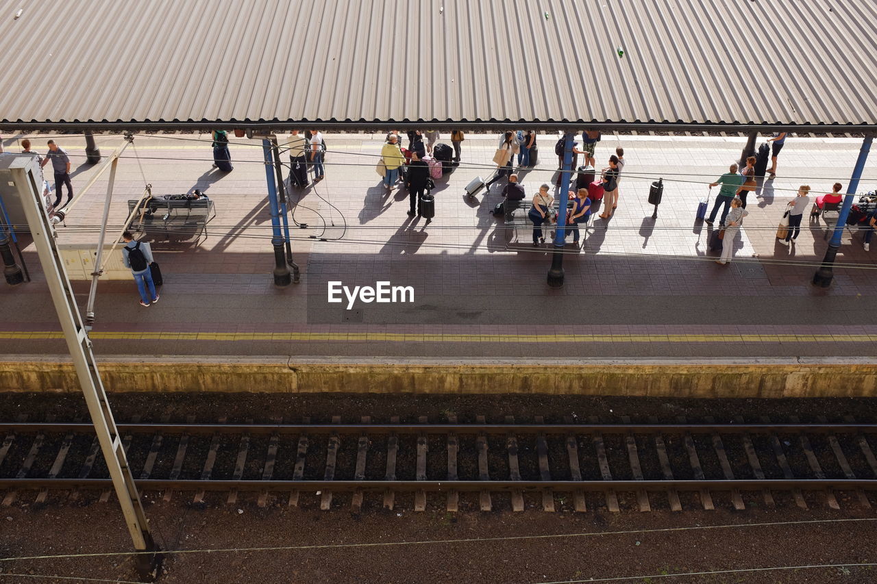 High angle view of people at railroad station