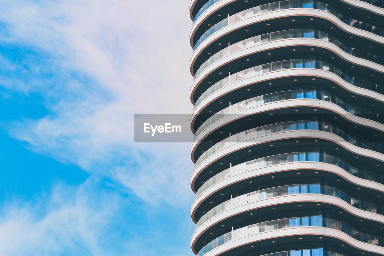 Low angle view of modern building against sky