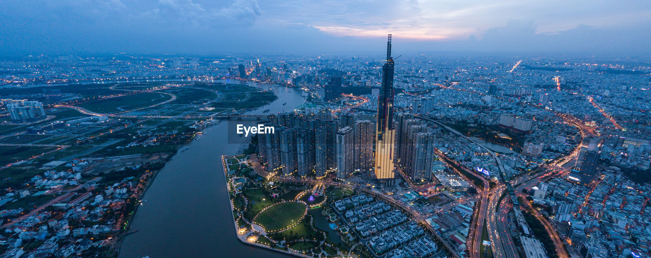 Panoramic drone view cityscape of ho chi minh city with twilight sky