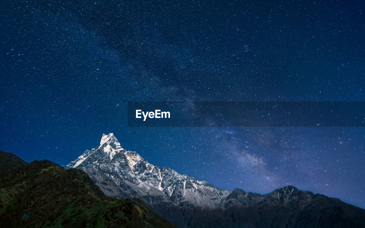 Beautiful night view of mountain fishtail and milky way, pokhara, nepal.