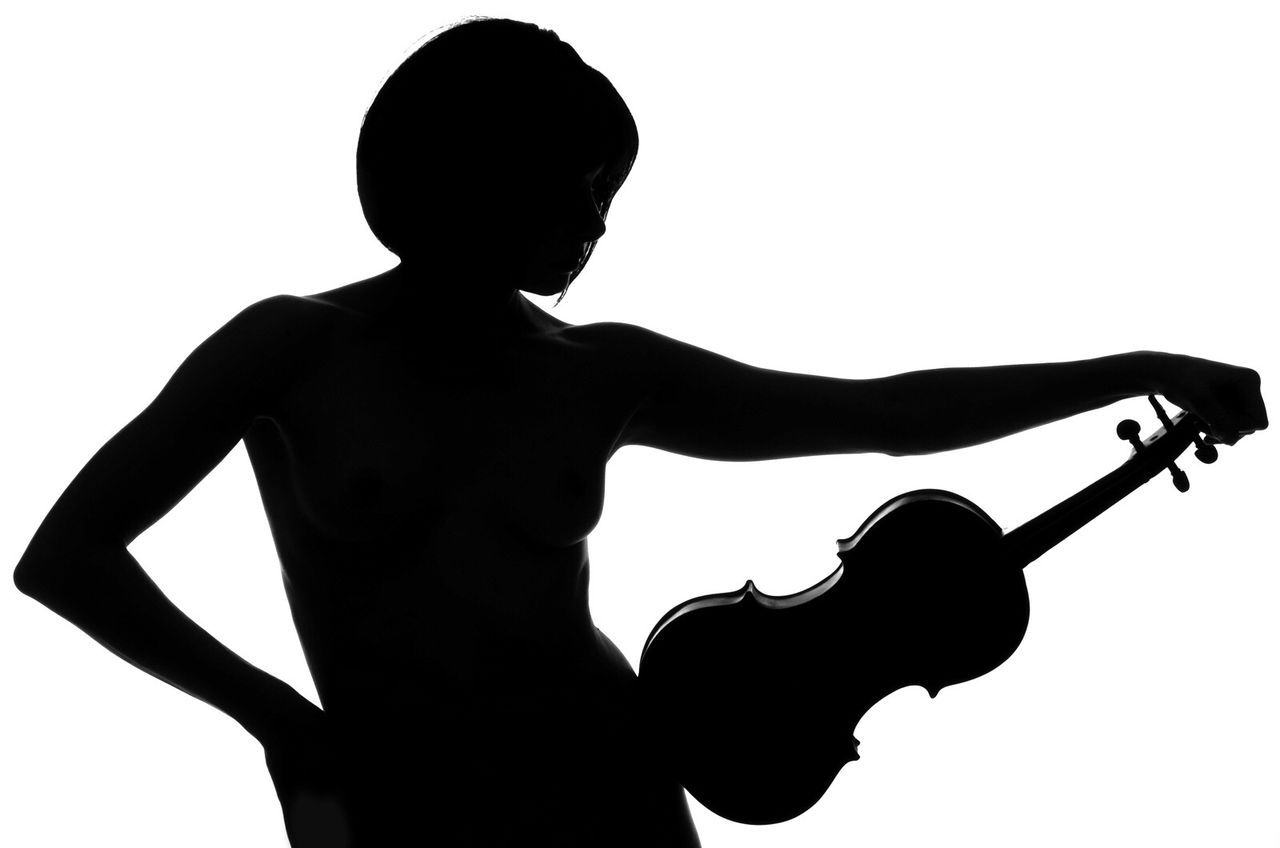 SILHOUETTE OF WOMAN AGAINST WHITE BACKGROUND