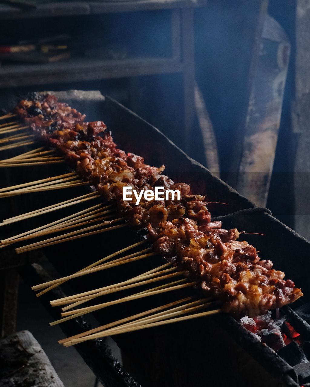 HIGH ANGLE VIEW OF FOOD ON BARBECUE GRILL