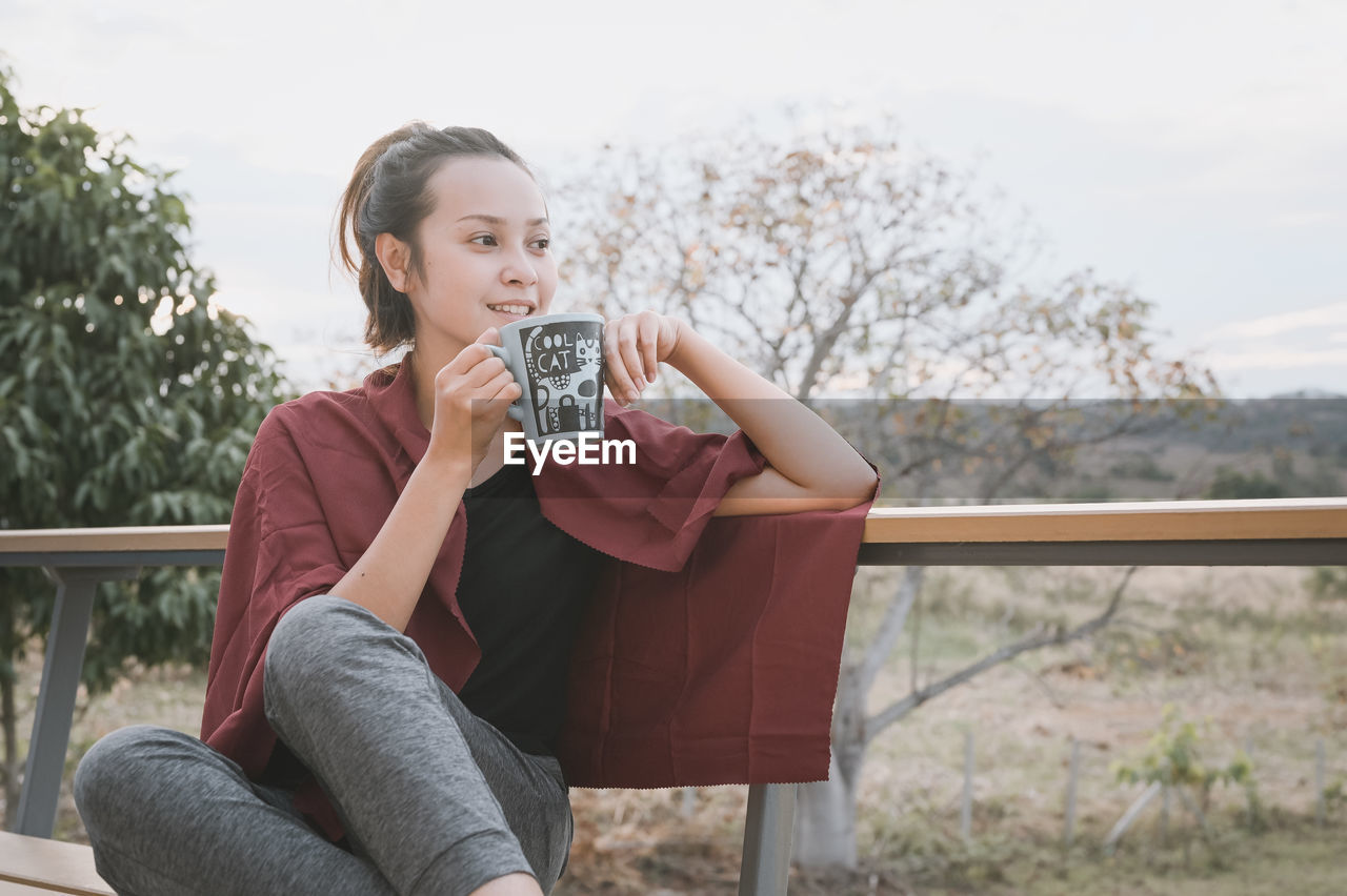 Series photo of young woman hand holding ceramic mug, positive emotion, chill and joyful
