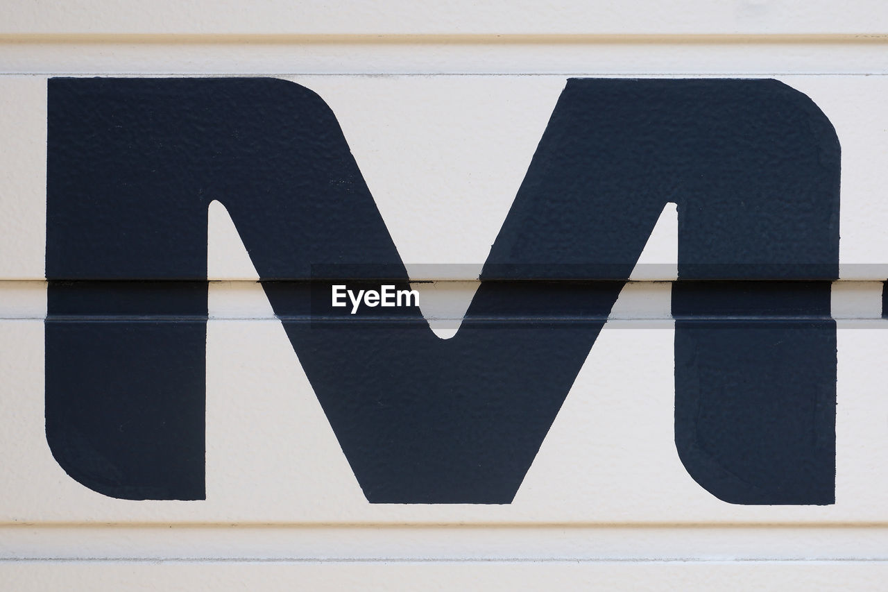 Close-up of letter m painting on wall