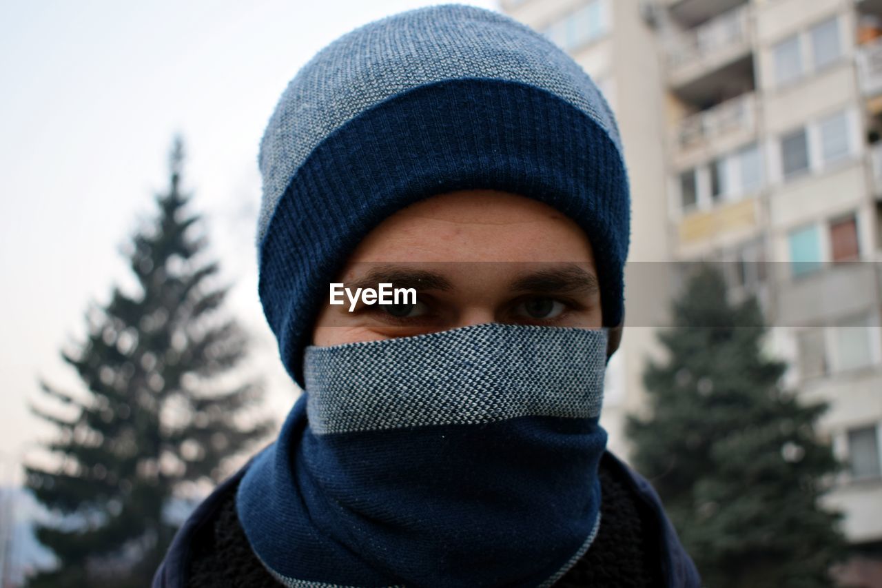 Close-up portrait of man in warm clothing