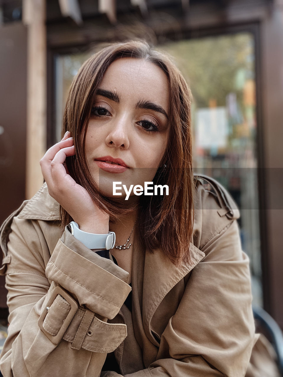 Portrait of young woman looking away