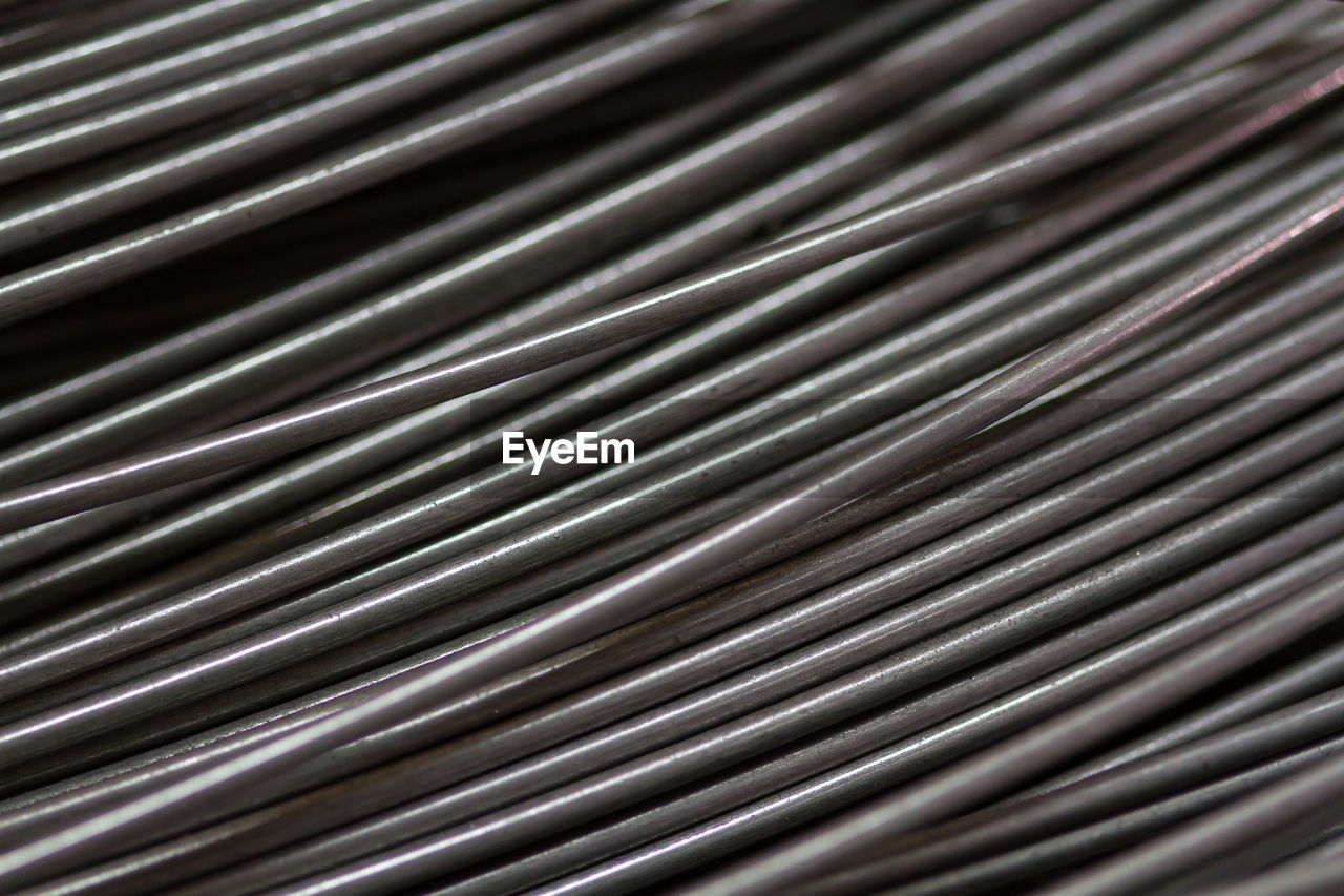 Stainless steel wire in production workshop or construction site. metal texture.