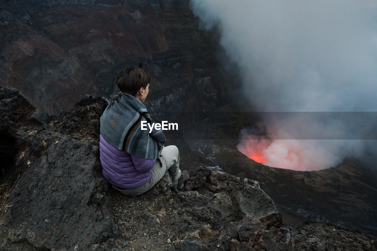 Woman looking at volcano