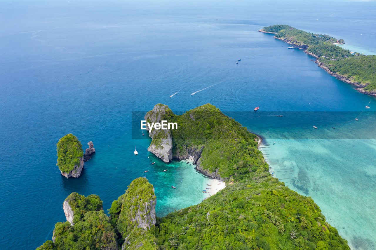 Phi phi island and tourist boat at krabi thailand aerial view