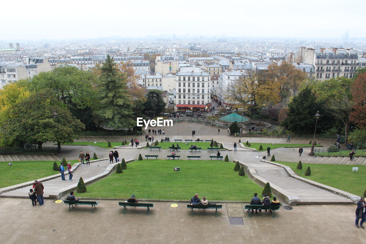 PEOPLE IN PARK IN CITY