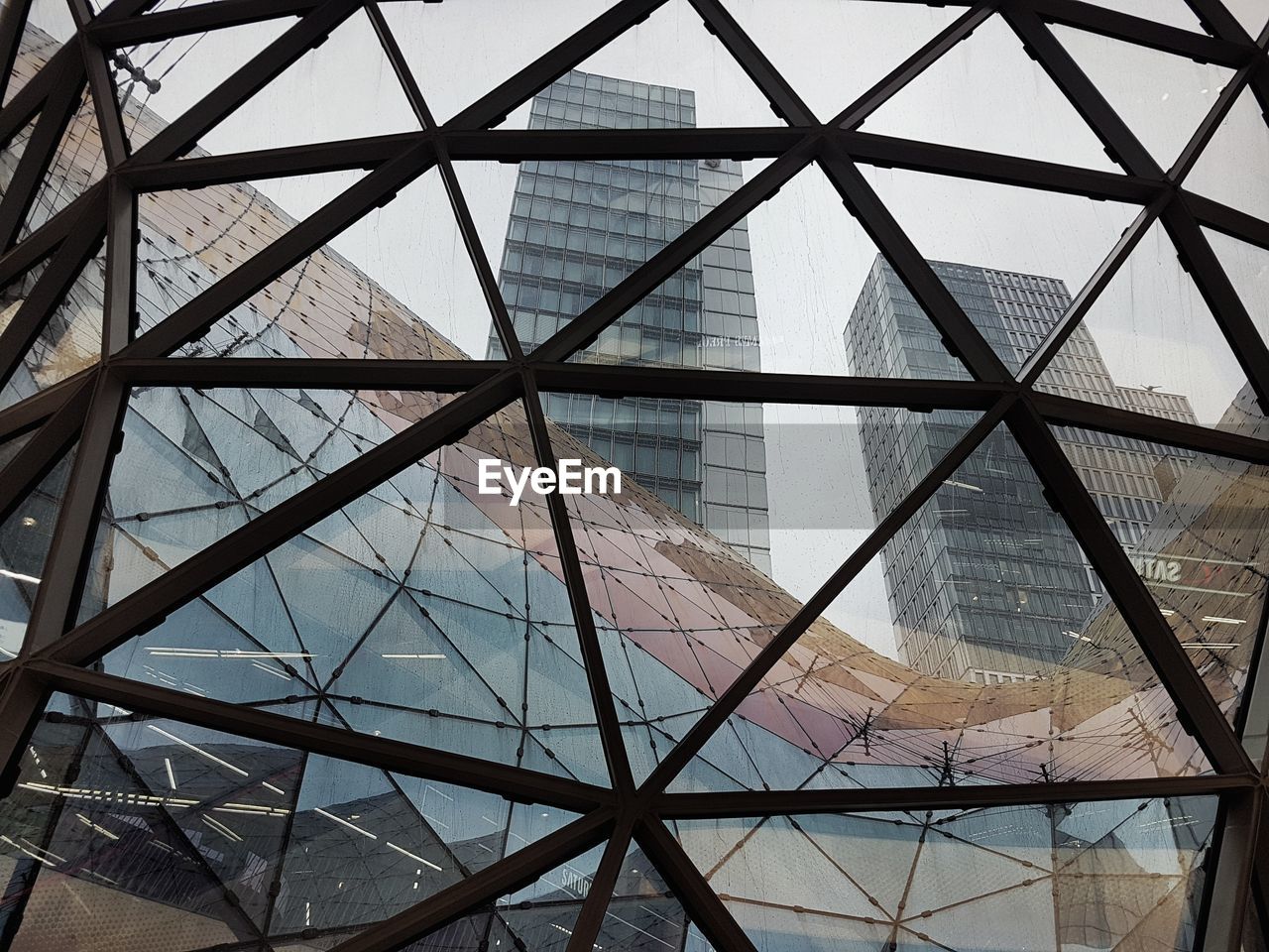 LOW ANGLE VIEW OF SKYLIGHT IN BUILDING