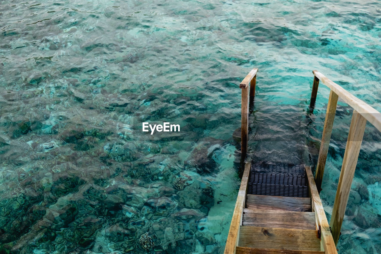 High angle view of swimming pool by sea