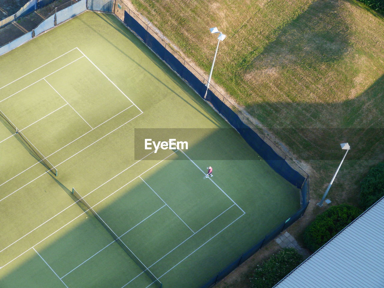 High angle view of tennis player playing in court