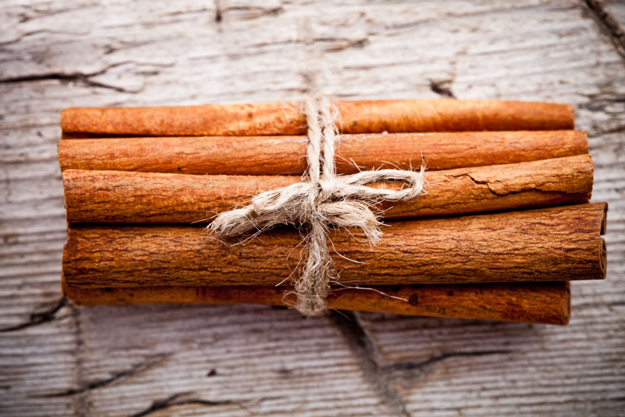 CLOSE-UP OF ROPES ON WOODEN TABLE