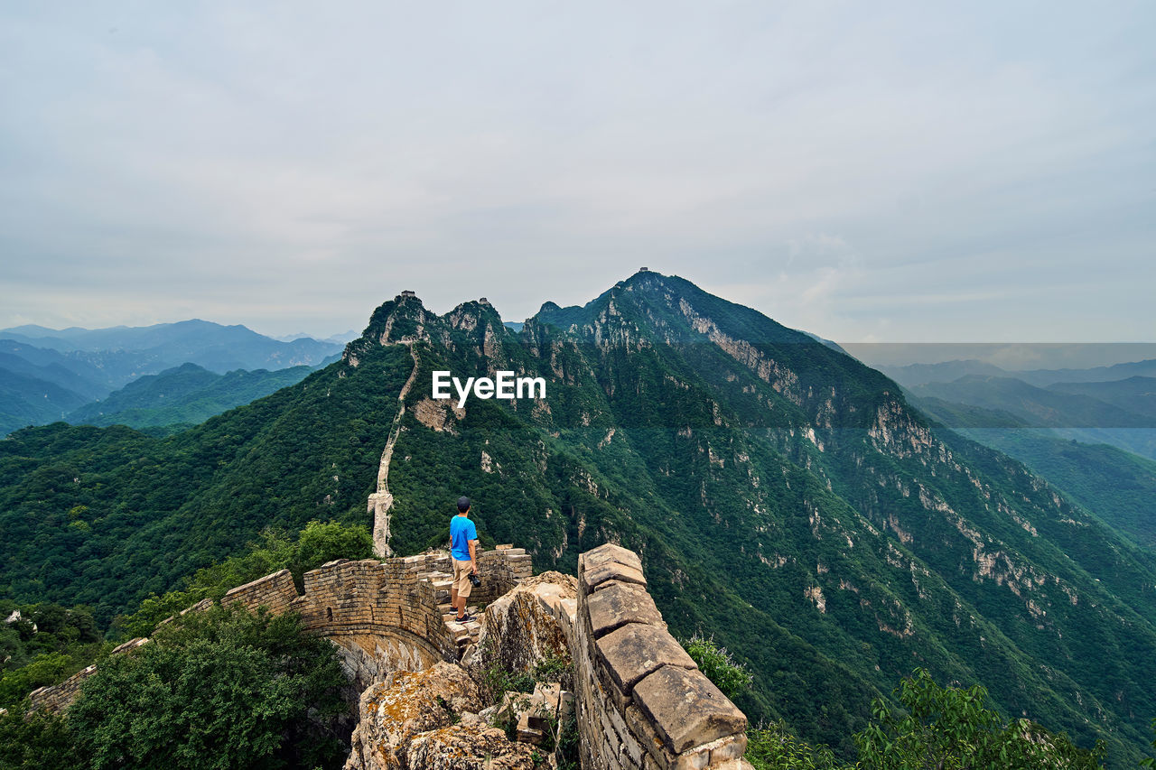 High angle view of man standing on great wall of china