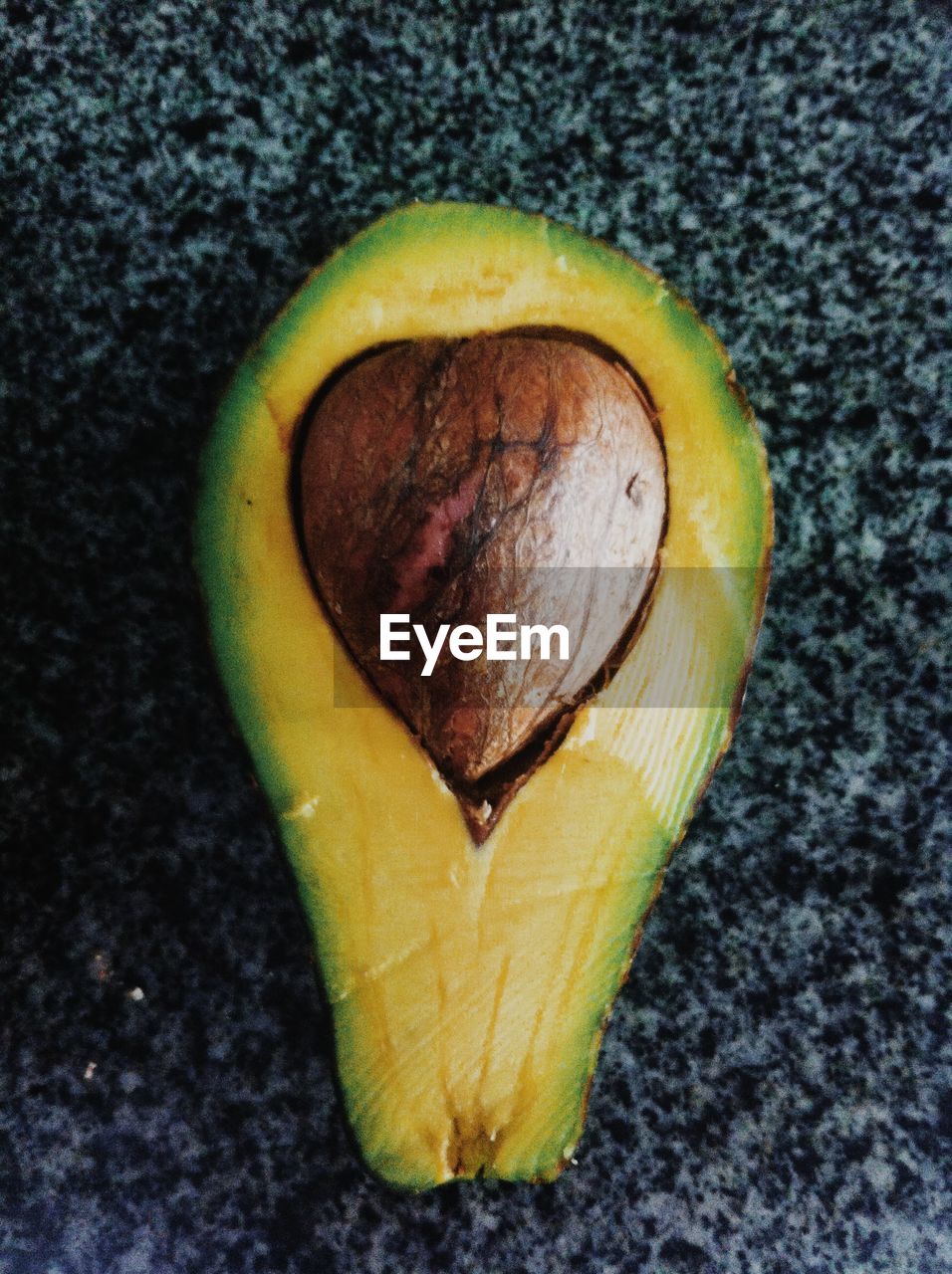 Close-up of avocado on table