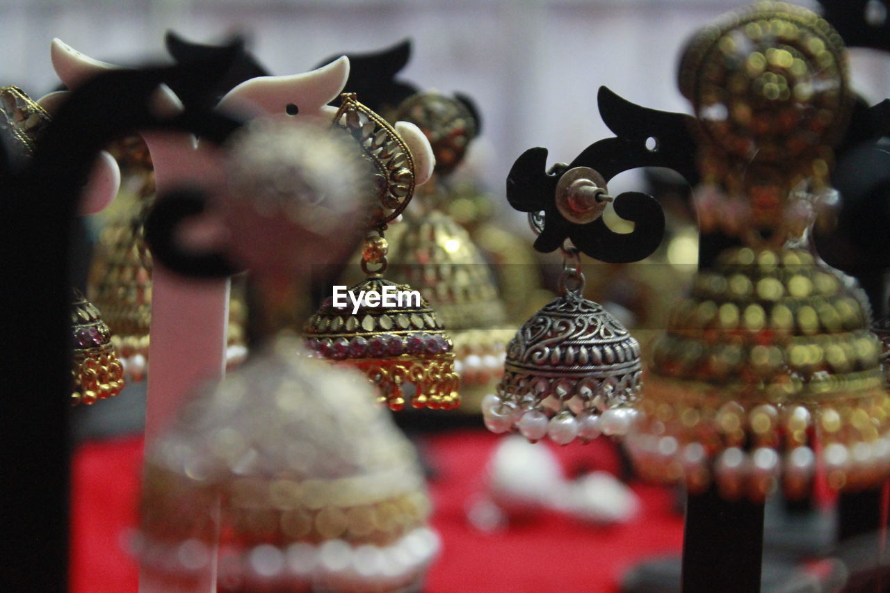 CLOSE-UP OF FIGURINES ON TABLE
