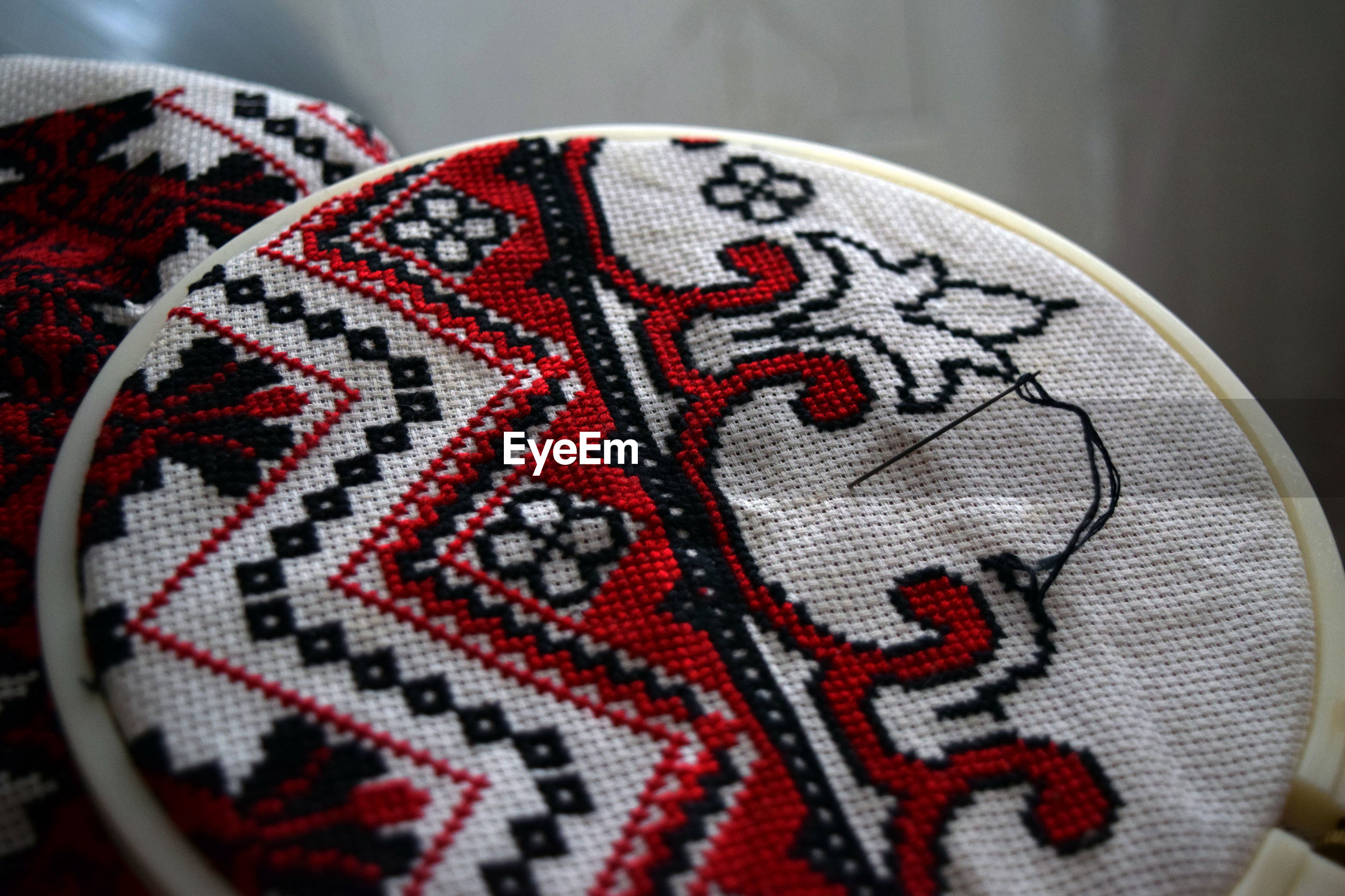 Closeup of fabric in embroidery ring  id 103752471