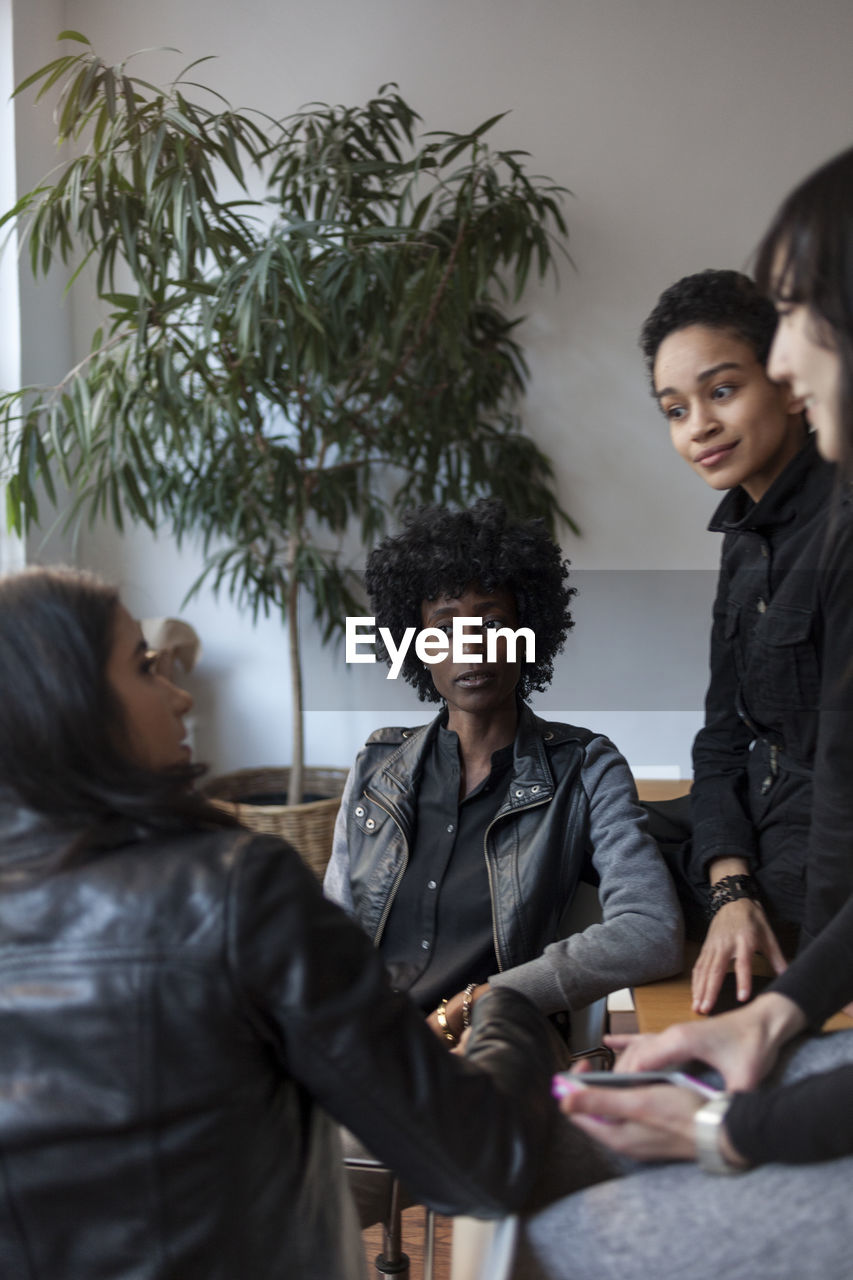 Young professional women working in an office space