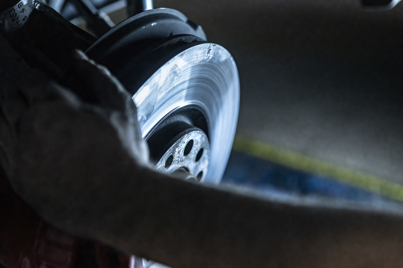 transportation, wheel, tire, motor vehicle, mode of transportation, car, automotive tire, vehicle, land vehicle, close-up, selective focus, auto part, sports, automotive exterior, driving, steering wheel, one person