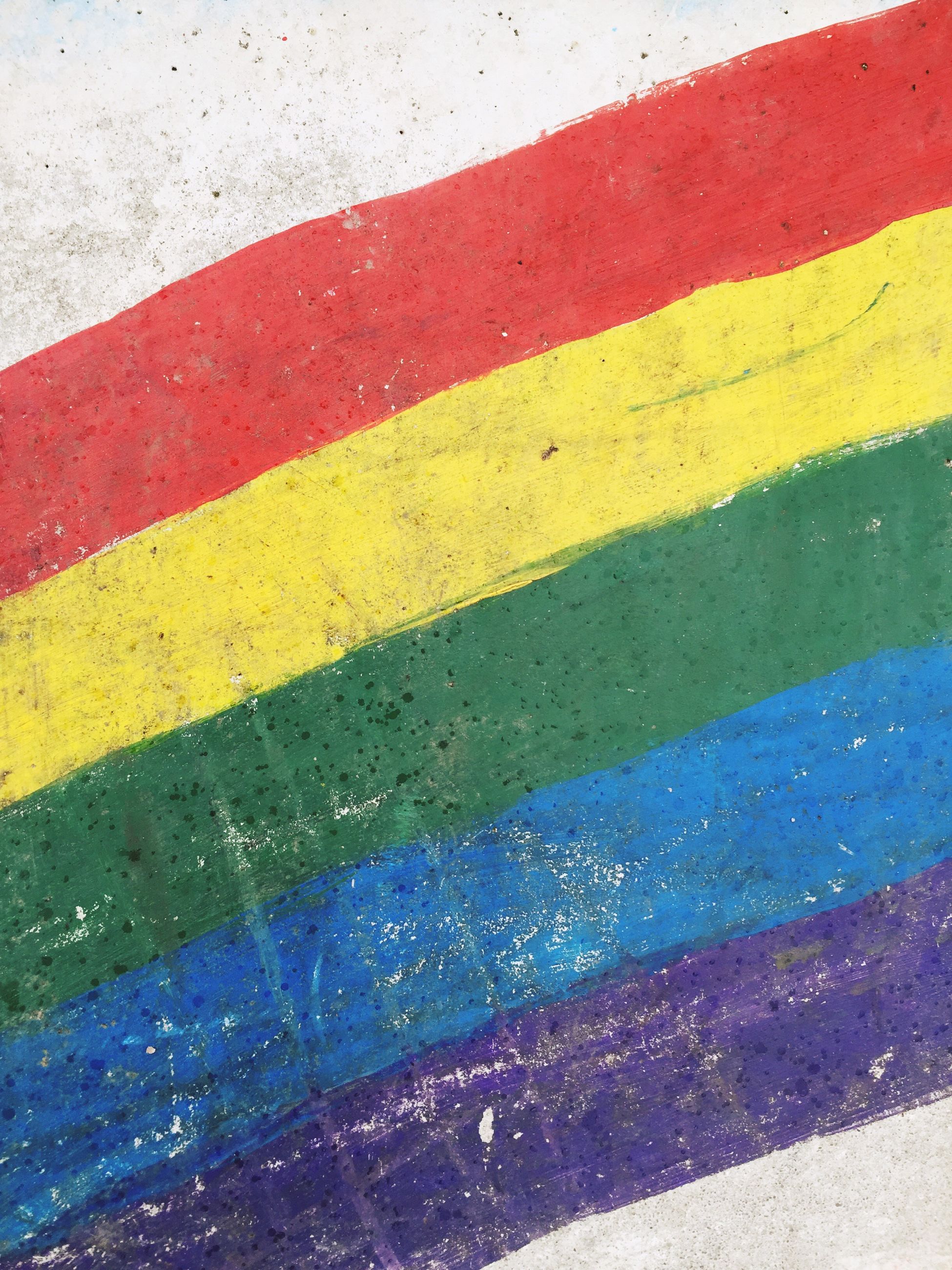 Close-up of rainbow colors painted on wall | ID: 83771130