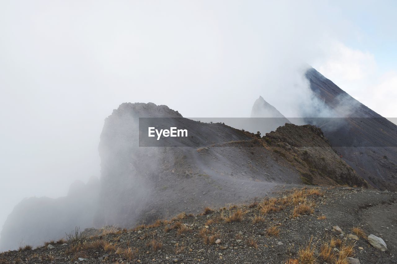 Scenic view of volcanic mountain against sky, mount meru, arusha national park, tanzania 