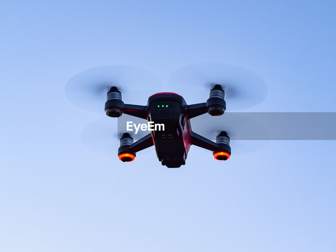 Low angle view of drone against clear sky