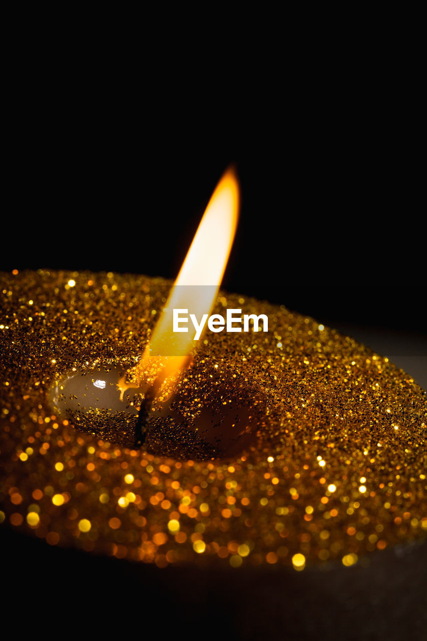 close-up of burning candle