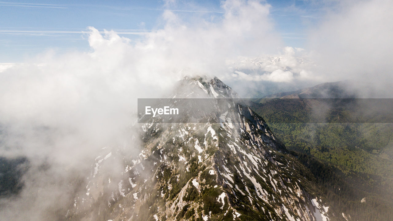 PANORAMIC SHOT OF MOUNTAINS AGAINST SKY