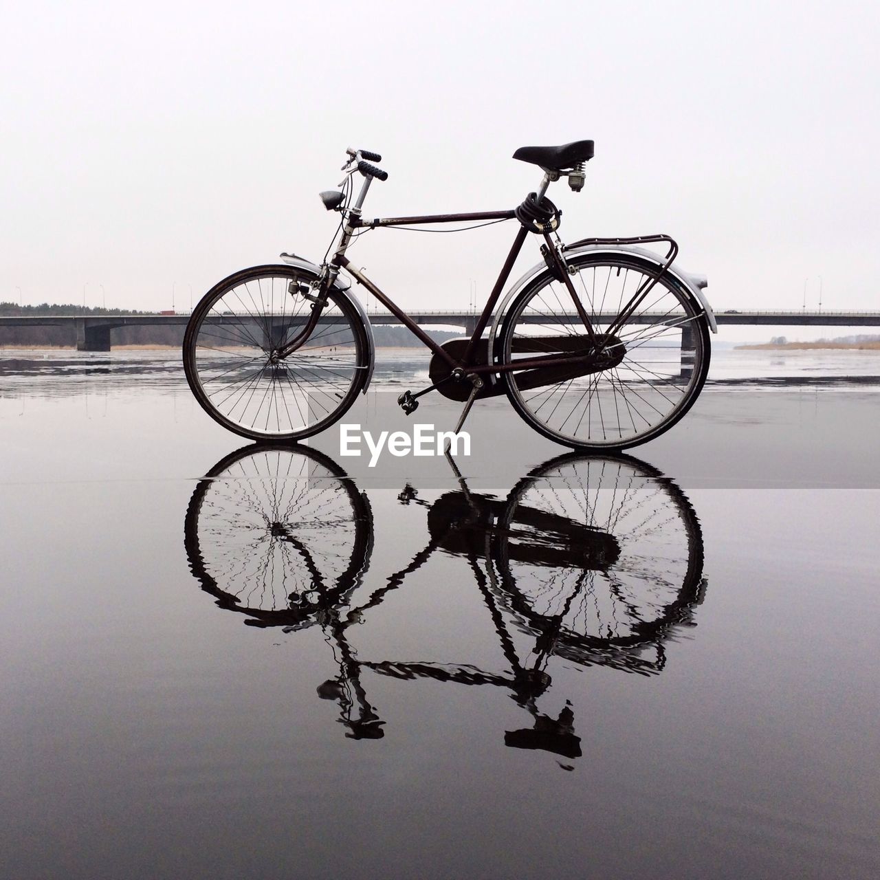 Bike reflected on water