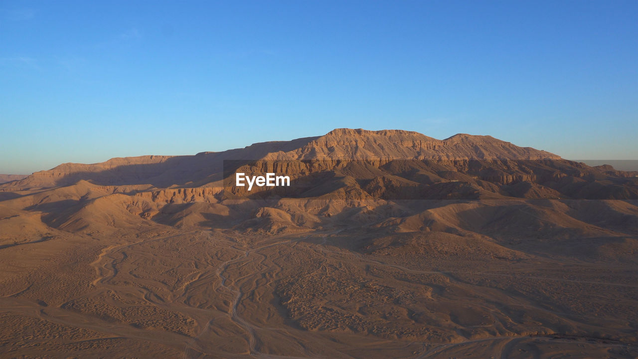 Luxor egypt panorama view riding hot air balloon over valley of the king sunrise aerial view video