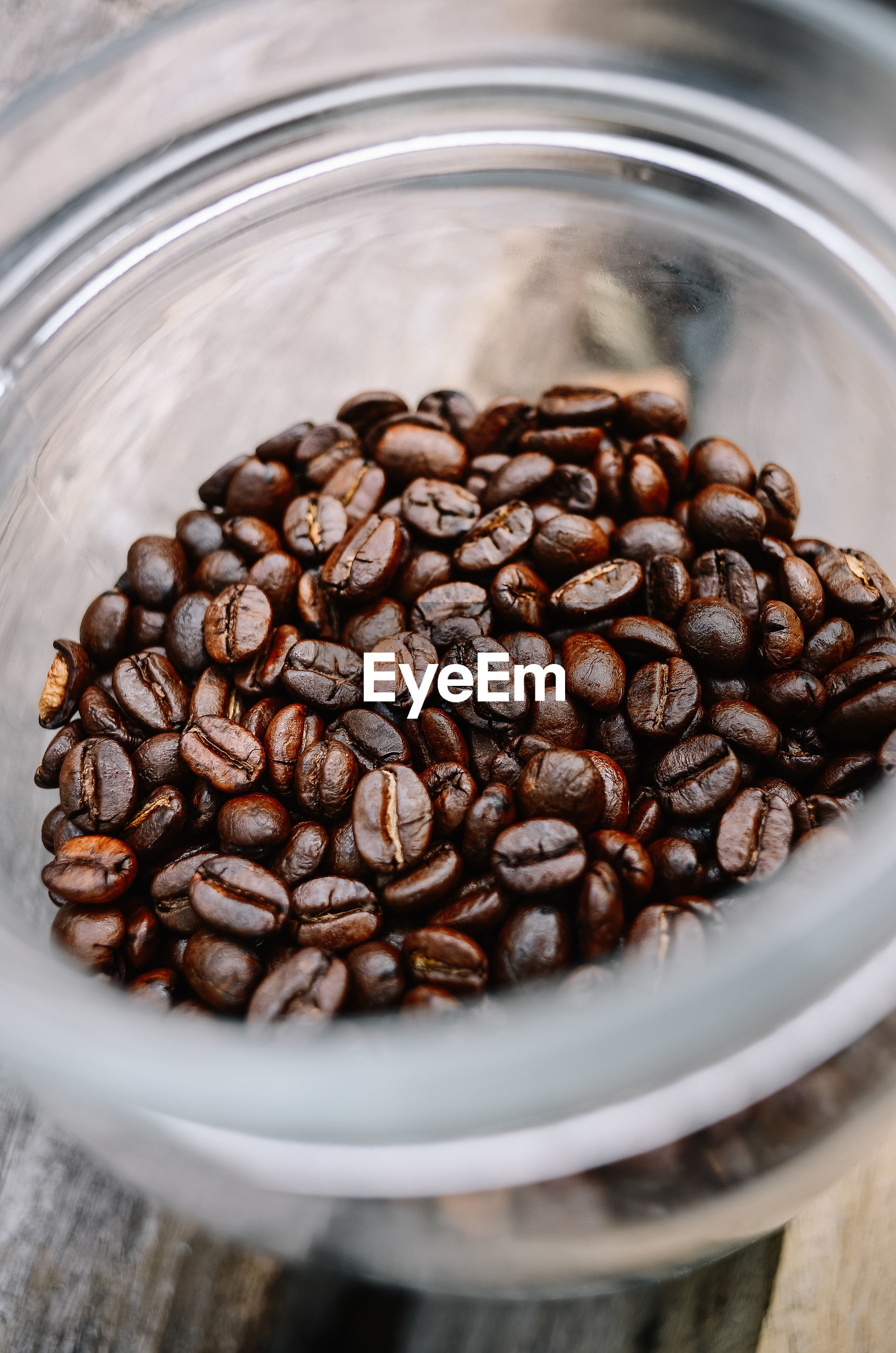 Download Close-up of coffee beans in glass jar | ID: 139584806