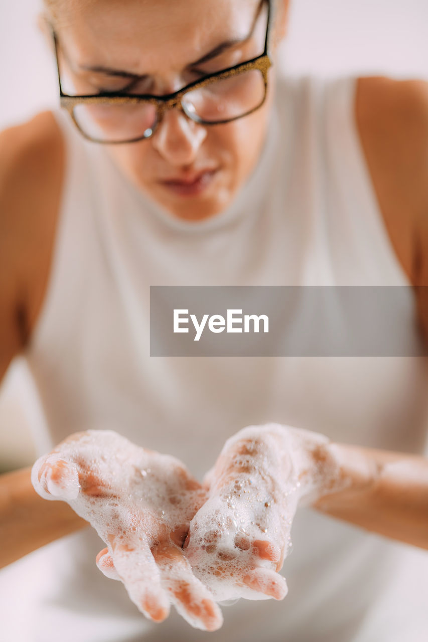 Obsessive compulsive disorder concept. woman obsessively washing her hands.