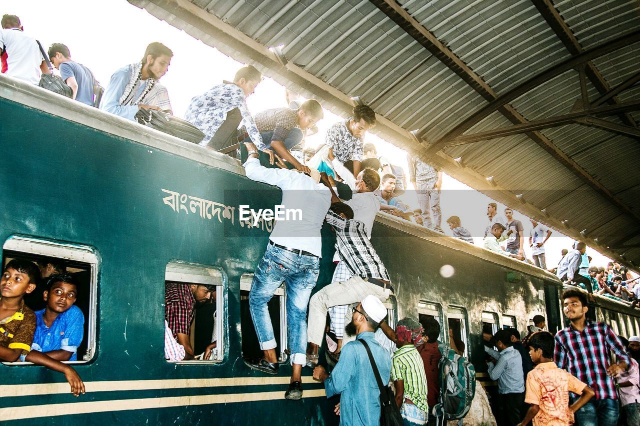 GROUP OF PEOPLE AT MARKET