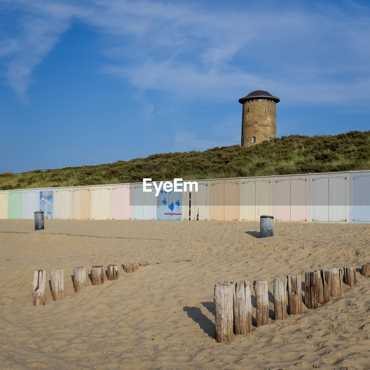 Scenic view of beach of domburg by sea against sky