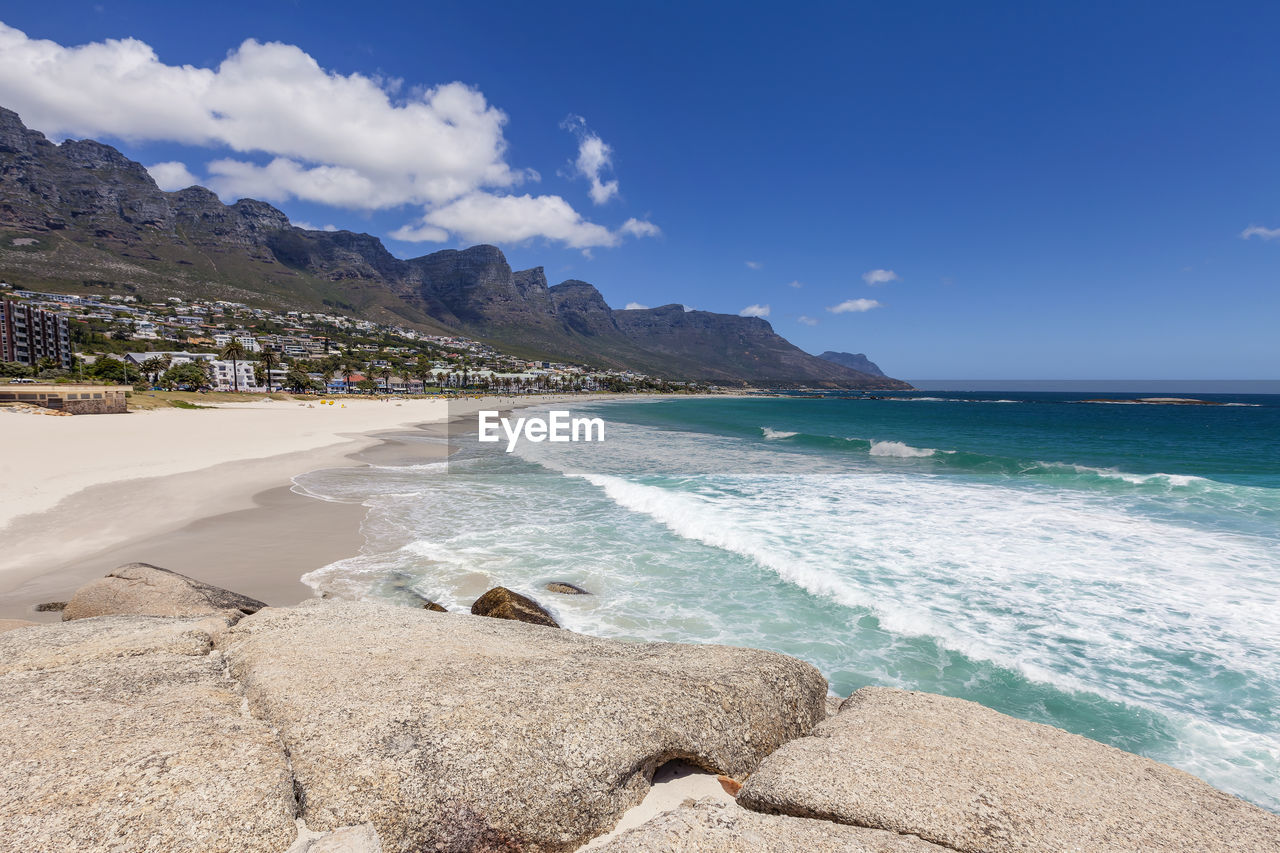 Panoramic view of camps bay beach and town suburb, cape town, south africa