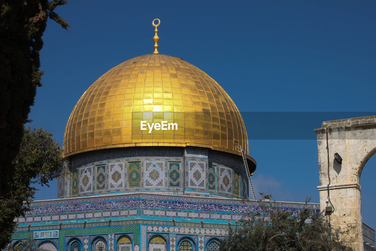 Low angle view of dome of the rock against sky