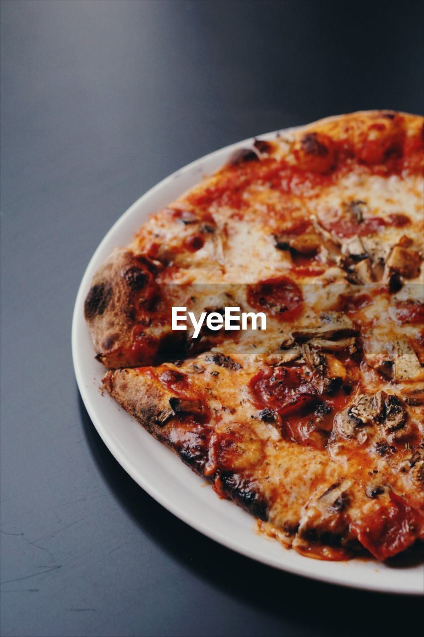 High angle view of pizza on table