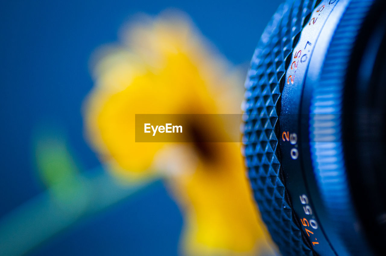 Close-up of yellow camera