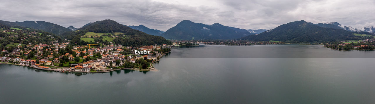 Drone shot over tegernsee outside munich showing lake and mountains. 