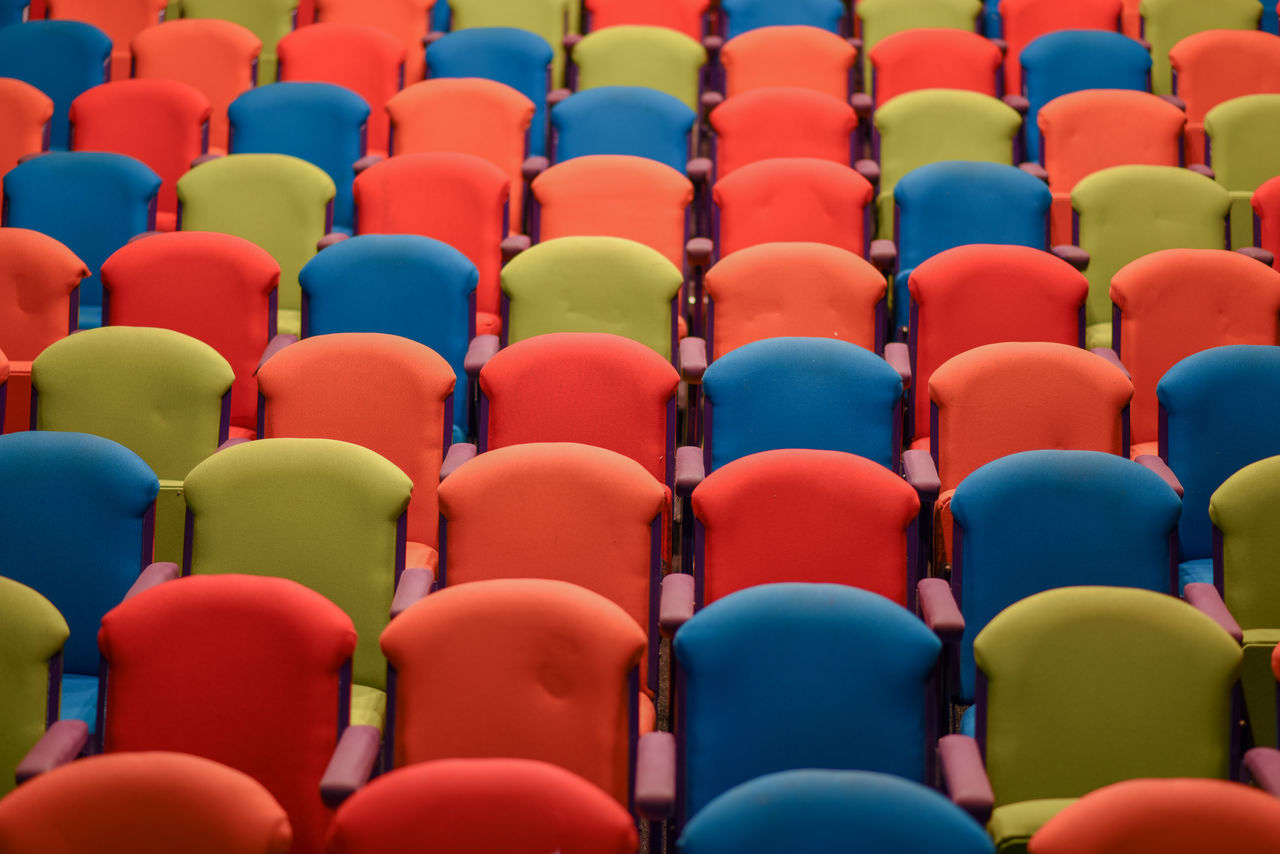 Assortment of colorful seats in a row