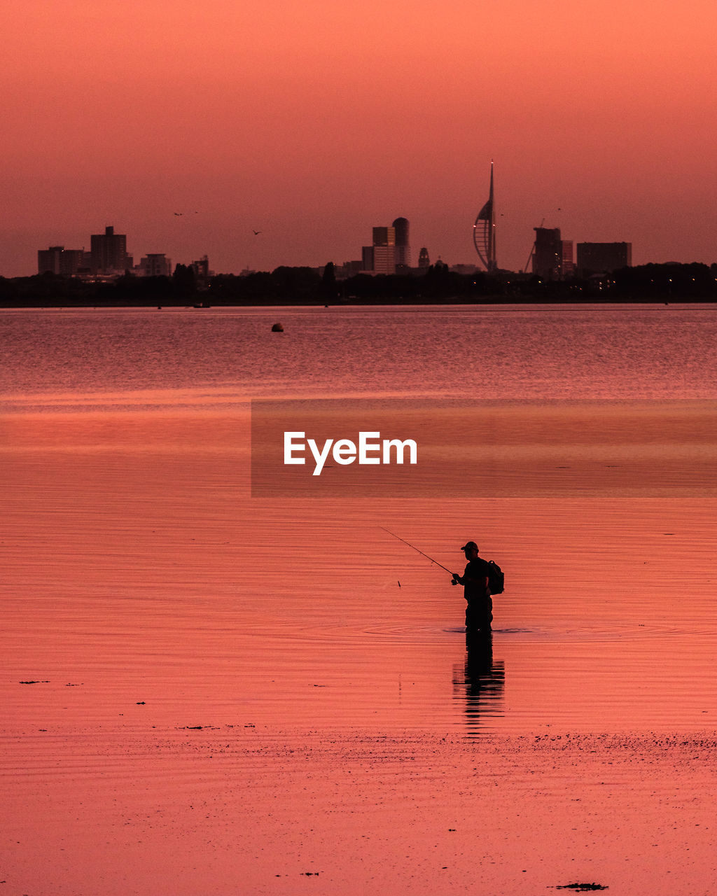 Sunset of fisherman from a hayling island, skyline and spinnaker tower / portsmouth 