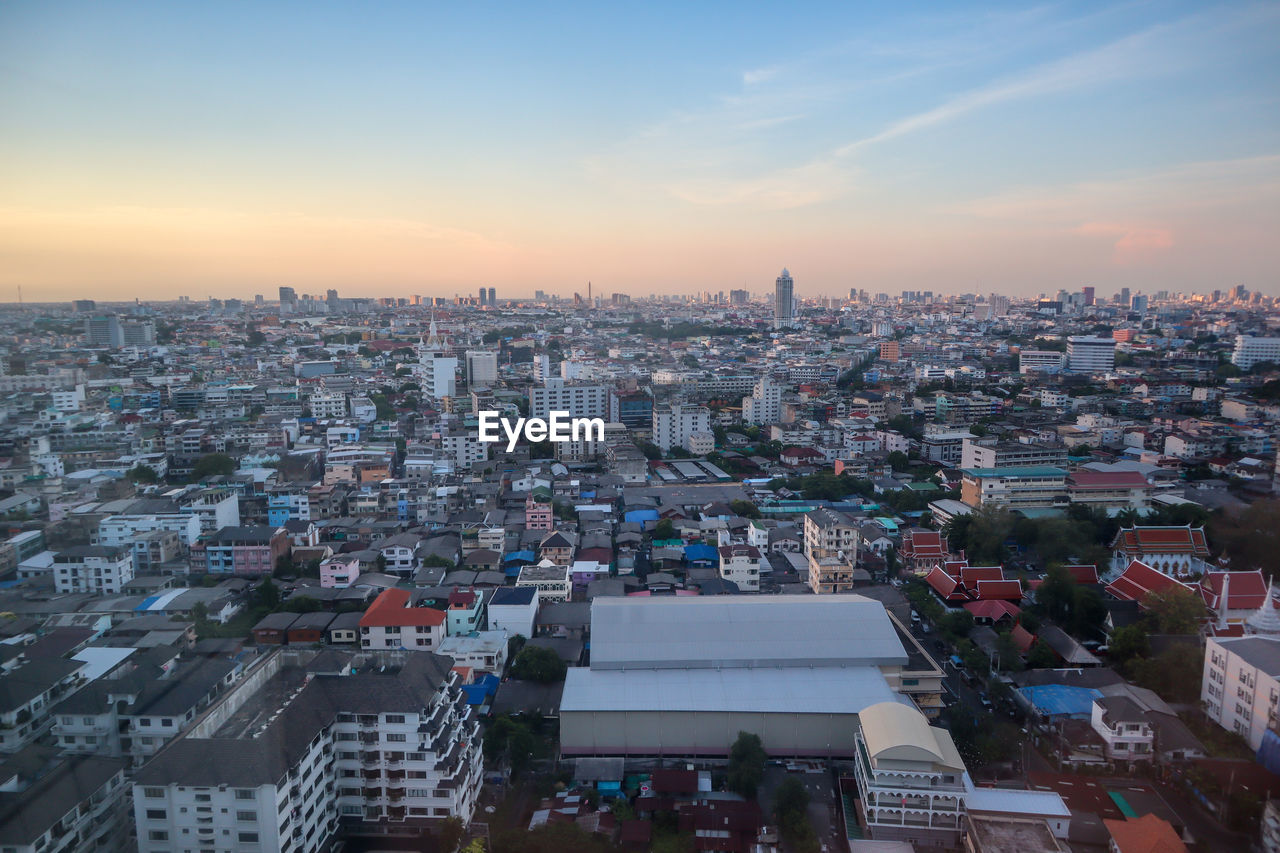 High angle view of townscape against sky during sunset