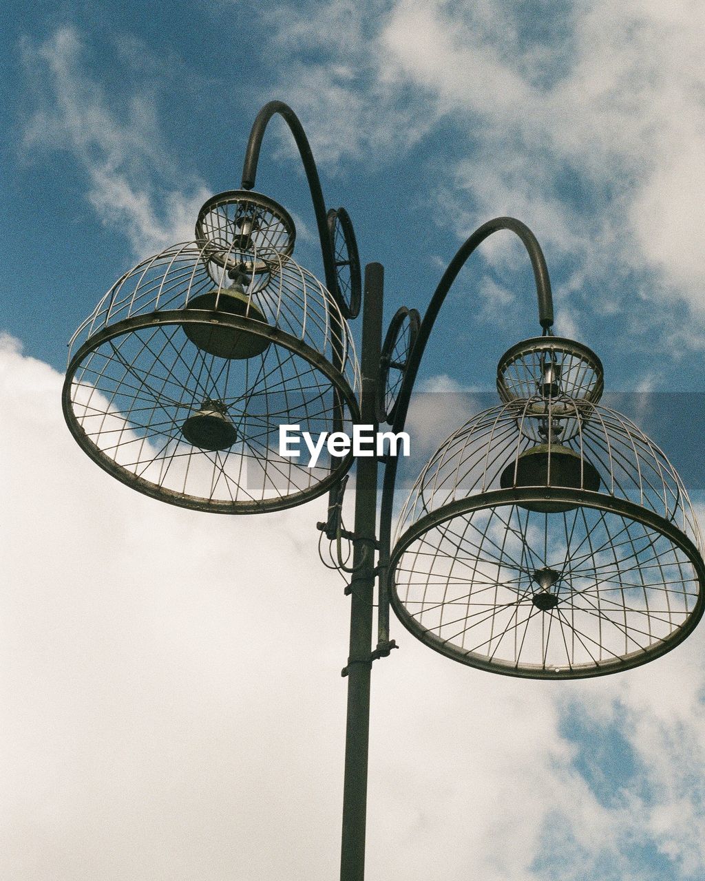 Low angle view of street light against sky