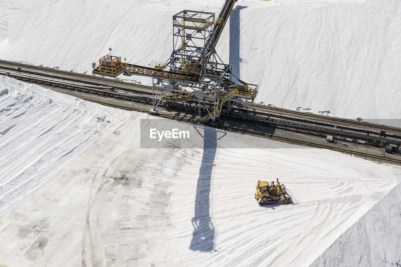 Salt piled up harvested from evaporation ponds in sf bay aerial