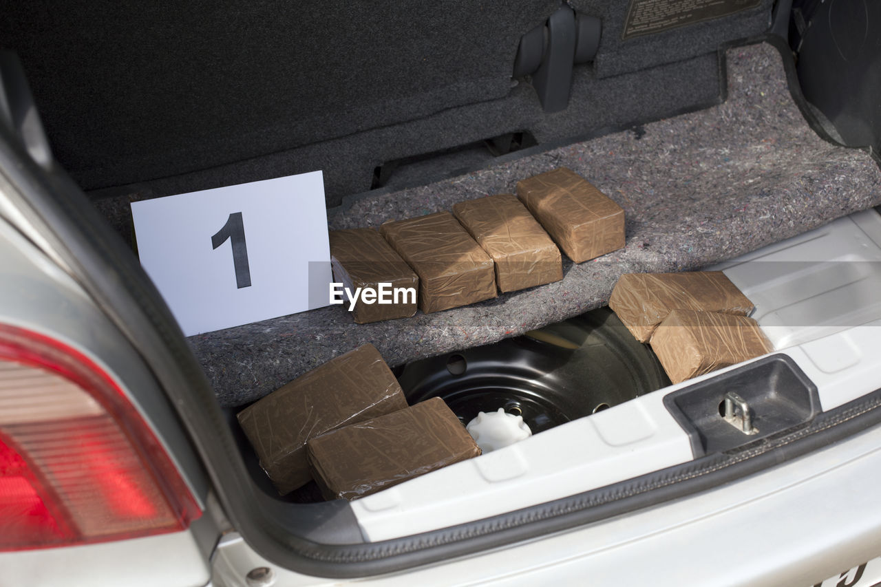 High angle view of drugs packed in car 