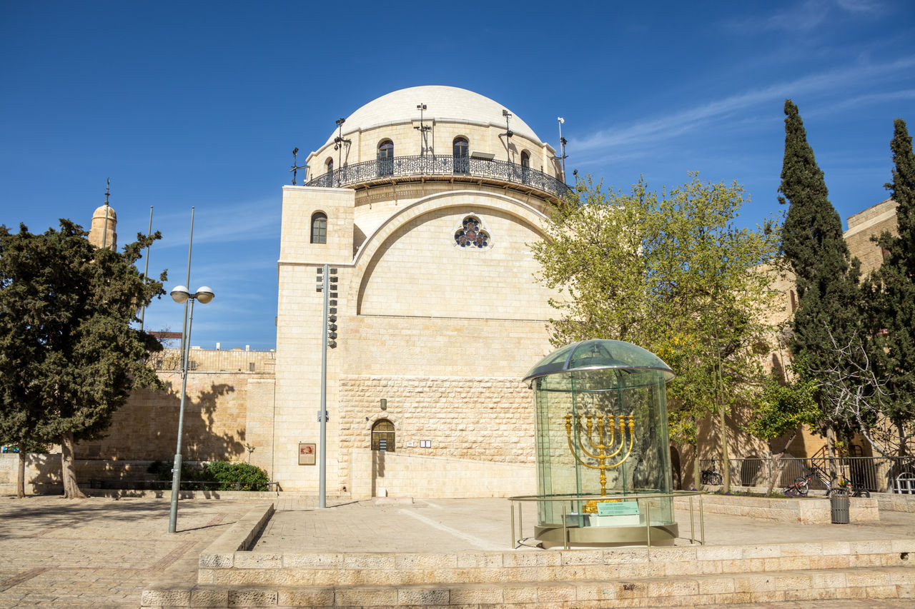 EXTERIOR OF TEMPLE AGAINST BUILDING