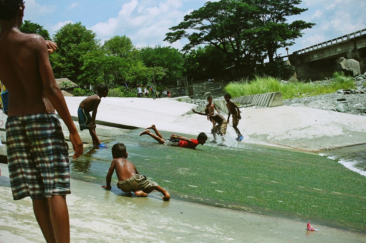 Group of children playing in water